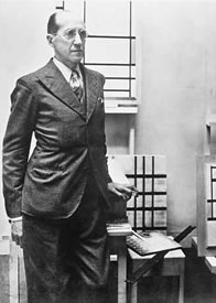 Mondrian in his studio at 278, Boulevard raspail. Photograph by Roge Andre, June—July, 1937.