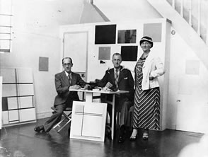 Mondrian in his studio at 278, boulevard raspail. Visited with his youngest brother carel and his wife Mary Mondriaan-Van Den Berg. Photo RKD, '5—Gravenhage. 1936